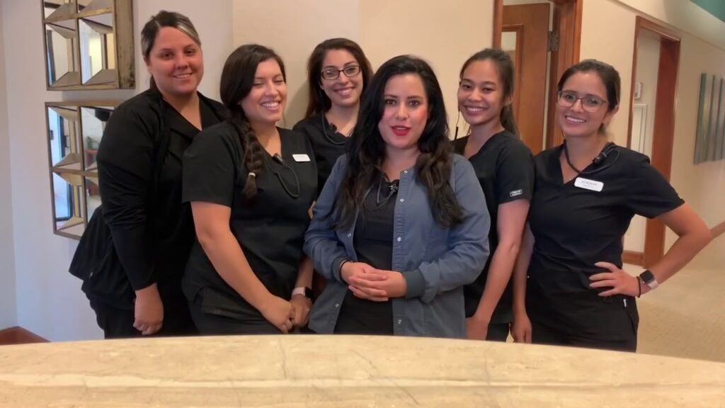 Group of female employees at Derby Dental Care, representing the dedicated and skilled team.